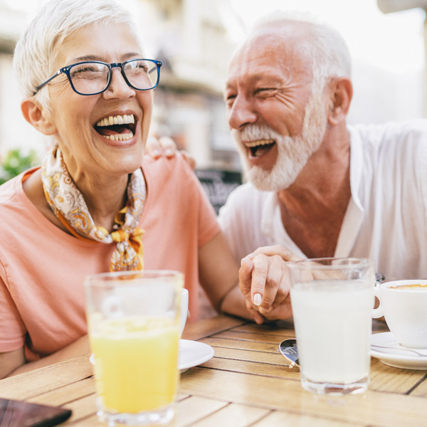 Senior couple in sidewalk cafe